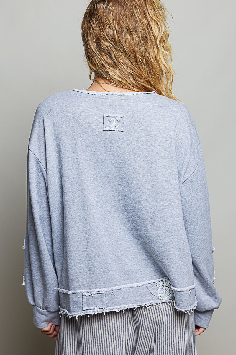 POL Exposed Outseam Crochet Patch V-Neck Sweatshirt with Open Wrap-Style Design